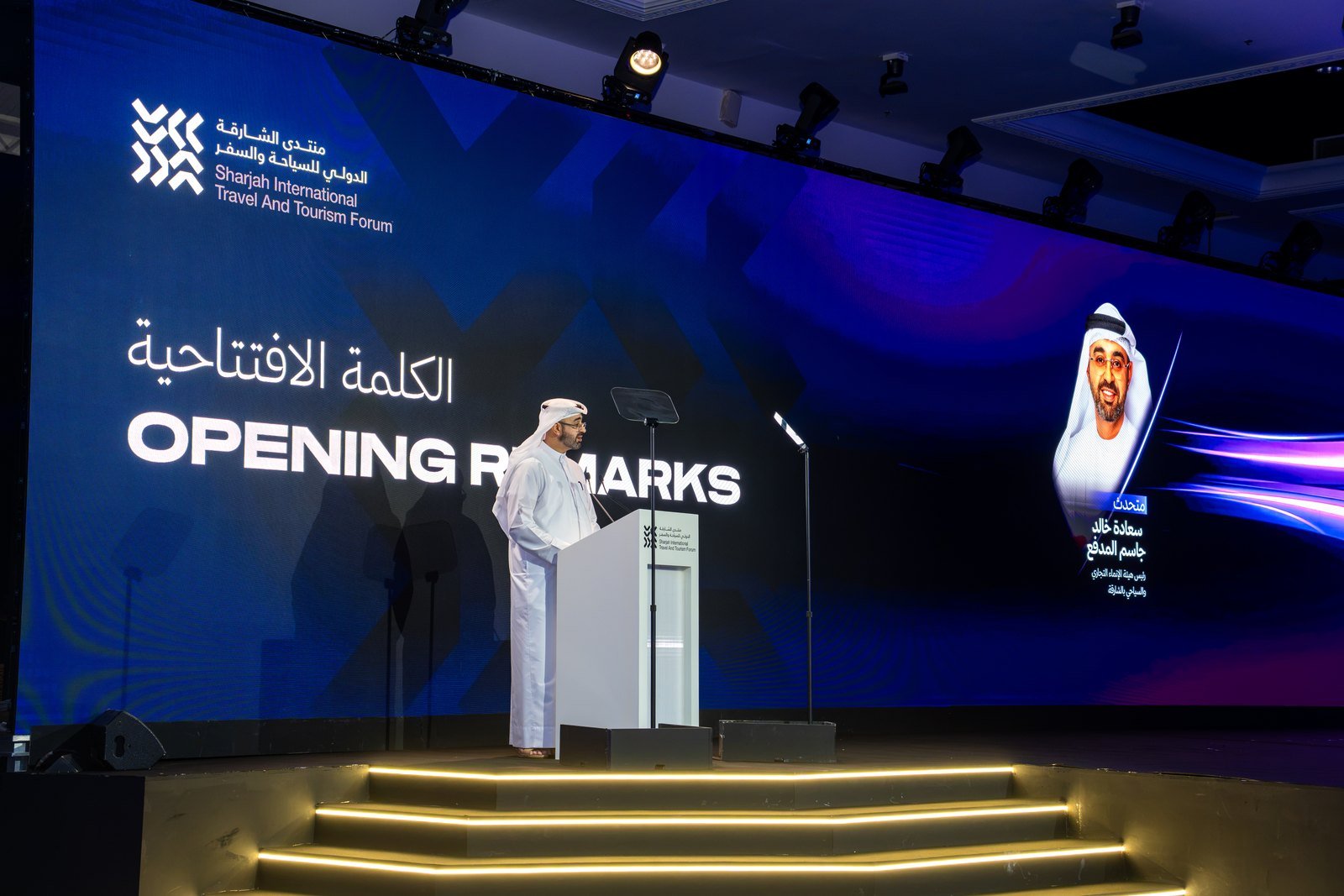 Speaker at podium during Sharjah International Travel and Tourism Forum opening ceremony