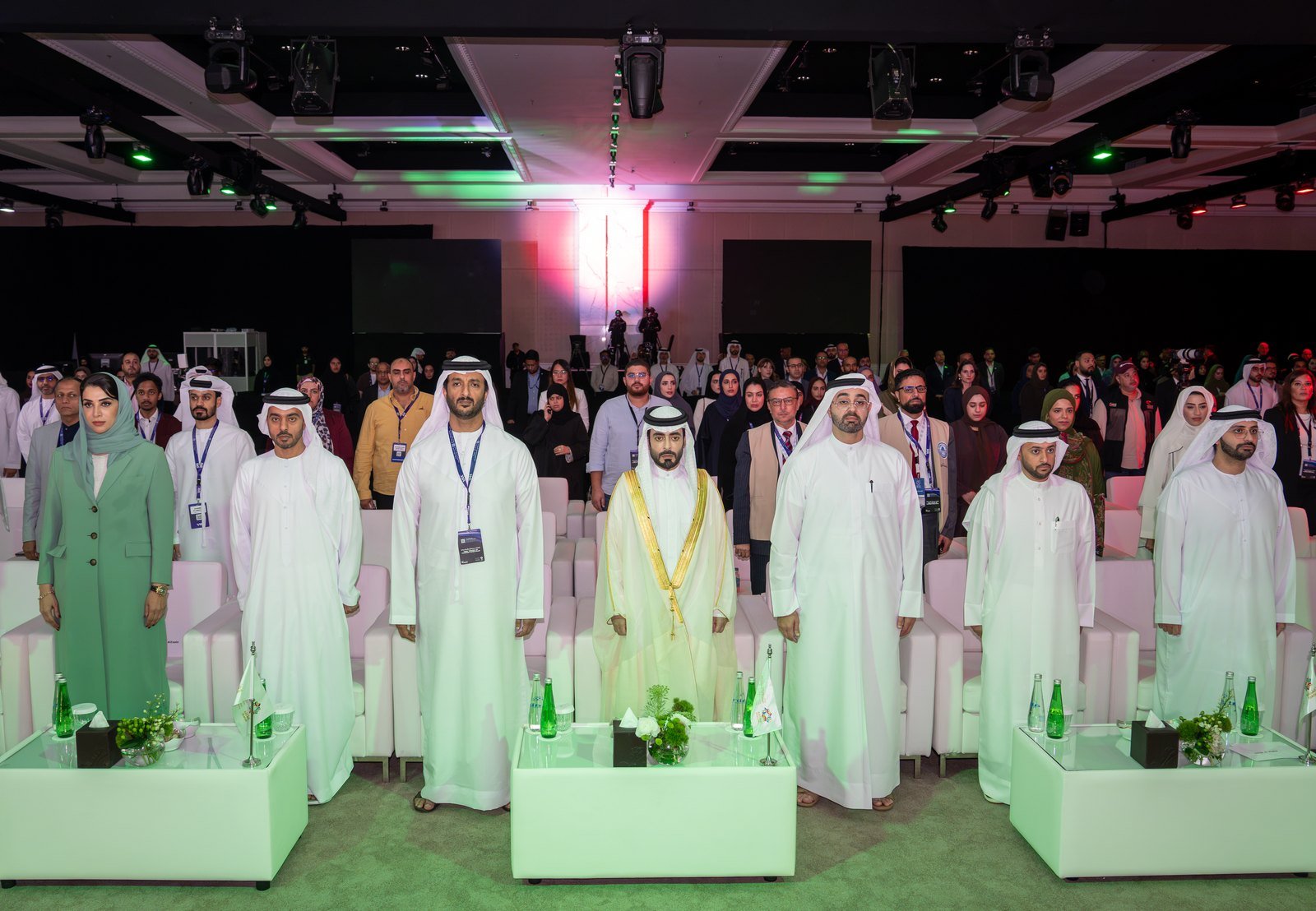 Forum participants in formal attire at the closing ceremony event hall