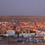 Edificio de la sede de la MINURSO con banderas marroquíes en Laayoune