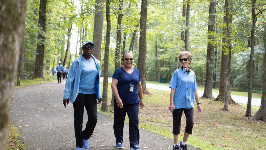 Group of women participating in outdoor group walking activity